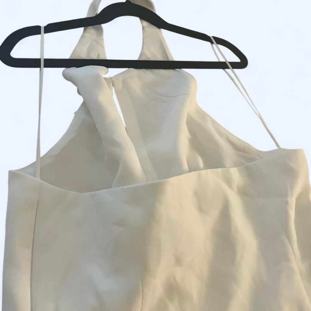 Elegant Cream Sleeveless Top with Bow Accents - Picture 6 of 7